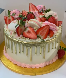Corina Bakery - custom cake with fruit and macarons
